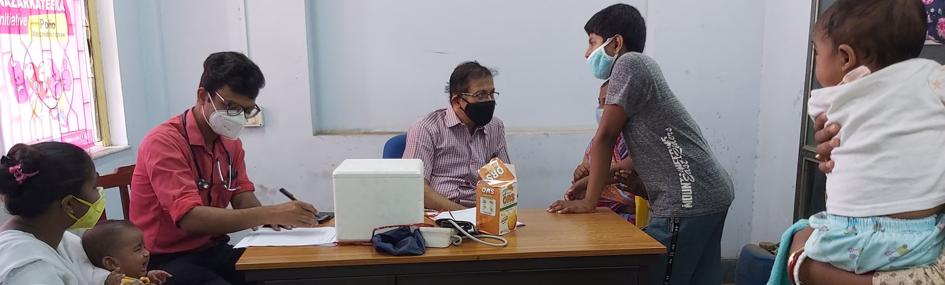 A caring doctor with a child patient